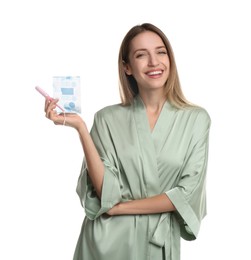 Photo of Happy young woman with disposable menstrual pad and tampon on white background