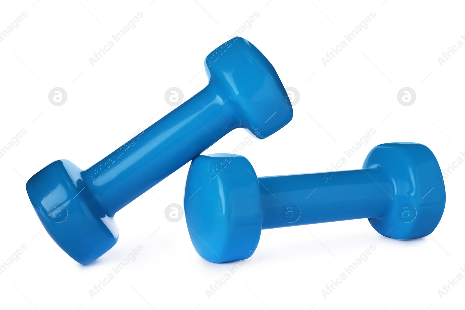 Photo of Color dumbbells on white background. Home fitness