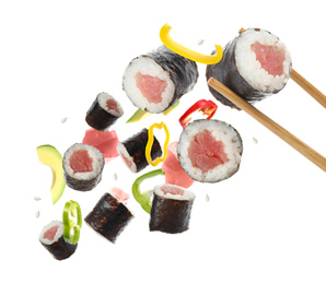 Sushi rolls with tuna and ingredients on white background