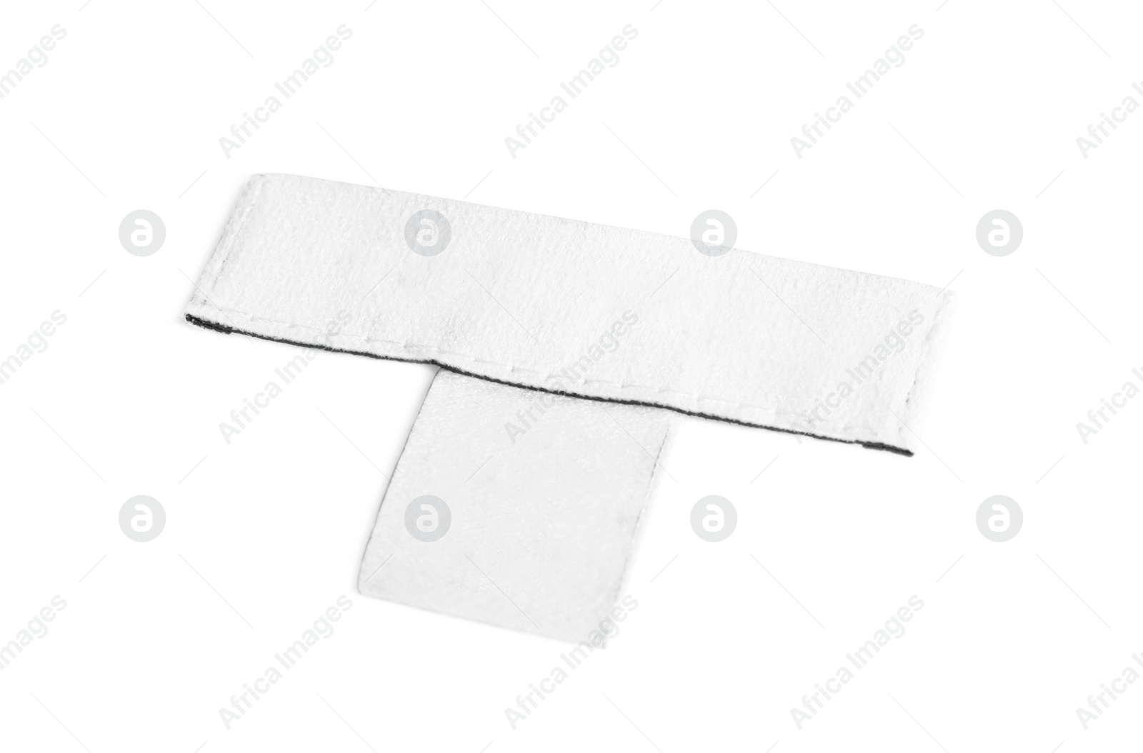 Photo of Blank stylish clothing label isolated on white