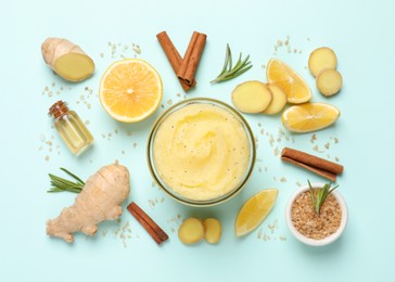 Photo of Flat lay composition with body scrub on turquoise background