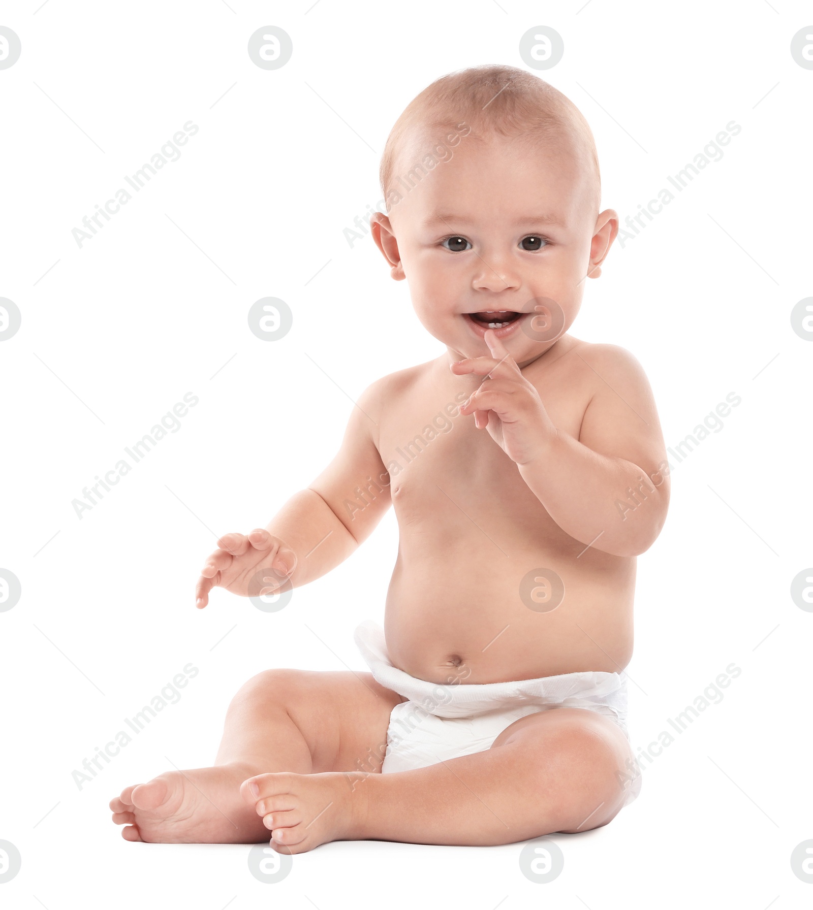 Photo of Cute little baby sitting on white background