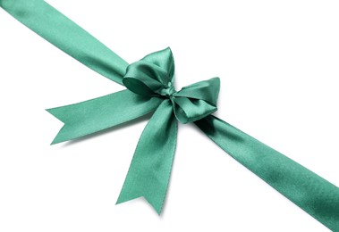 Photo of Green satin ribbon with bow isolated on white