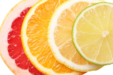 Slices of fresh ripe citrus fruits as background, top view