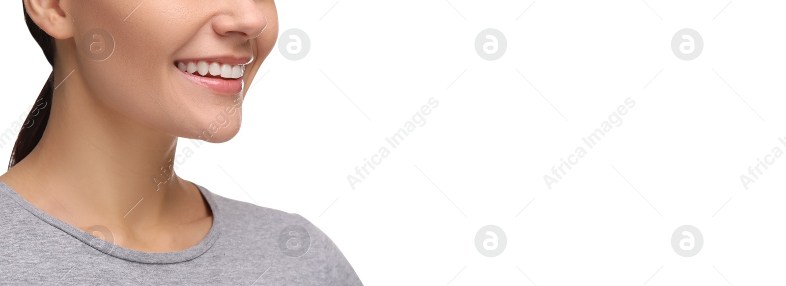 Image of Woman with clean teeth smiling on white background, closeup. Banner design with space for text
