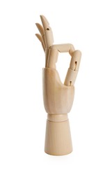 Photo of Wooden mannequin hand showing okay gesture on white background
