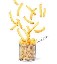 Tasty French fries falling into metal basket on white background