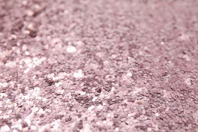 Photo of Color glitter as background. Bright festive decoration