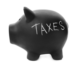 Photo of Black piggy bank with word TAXES on white background