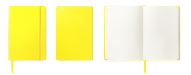 Set with bright yellow notebooks on white background, top view. Banner design