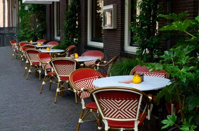 Beautiful view of outdoor cafe with stylish furniture