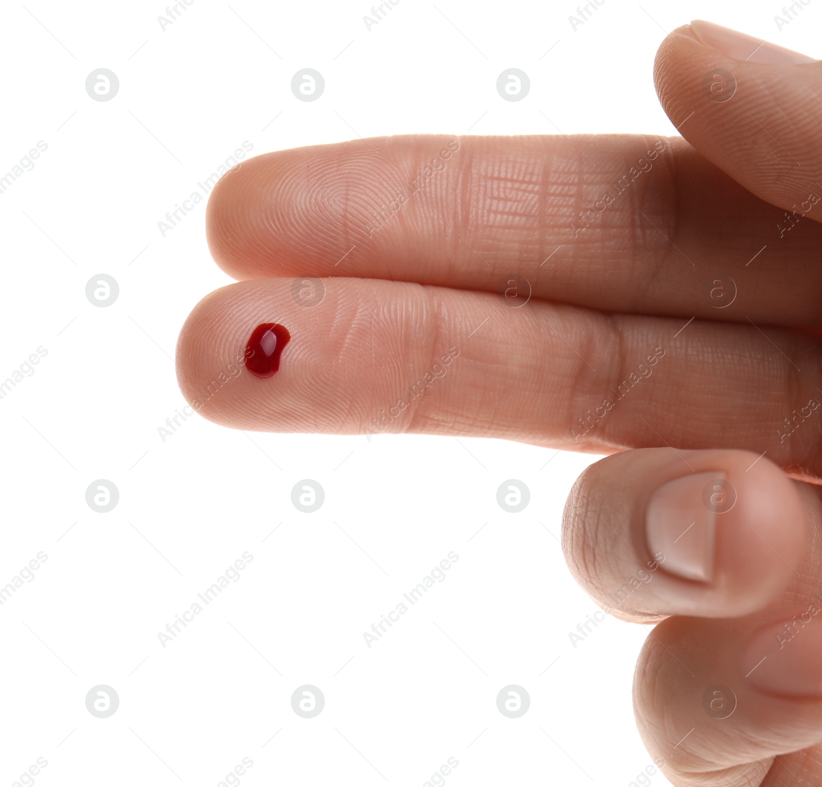 Photo of Woman with pricked finger and blood drop on white background, closeup