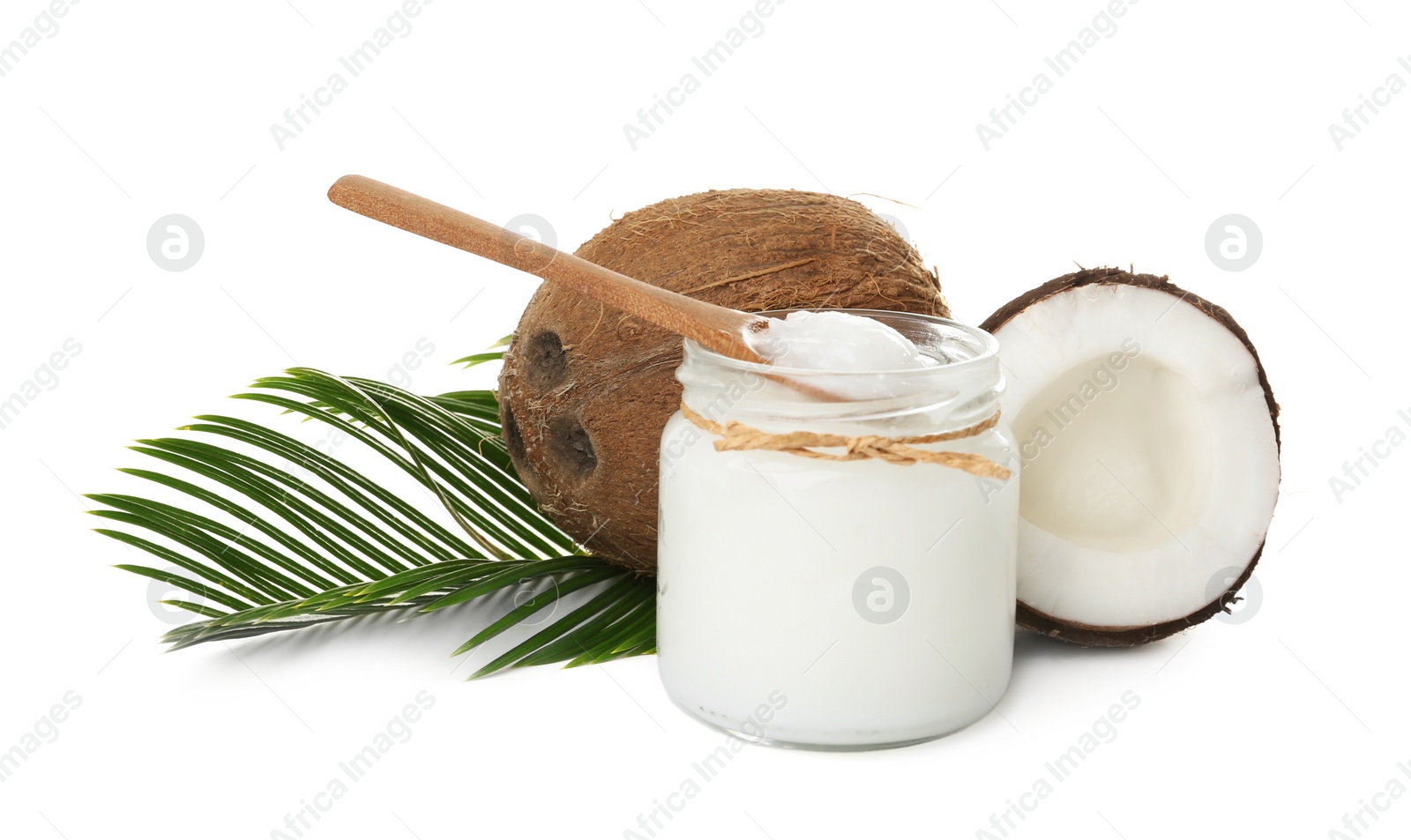 Photo of Composition with organic coconut oil on white background. Healthy cooking