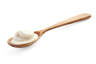 Photo of Sour cream in wooden spoon isolated on white