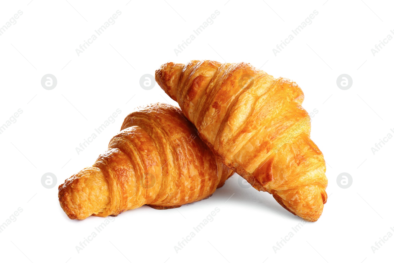 Photo of Fresh tasty croissants on white background. French pastry