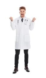 Full length portrait of emotional medical doctor with stethoscope isolated on white