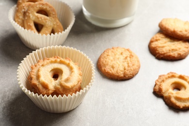 Tasty Danish butter cookies on grey table