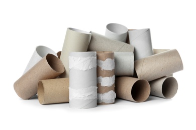 Empty toilet paper rolls on white background