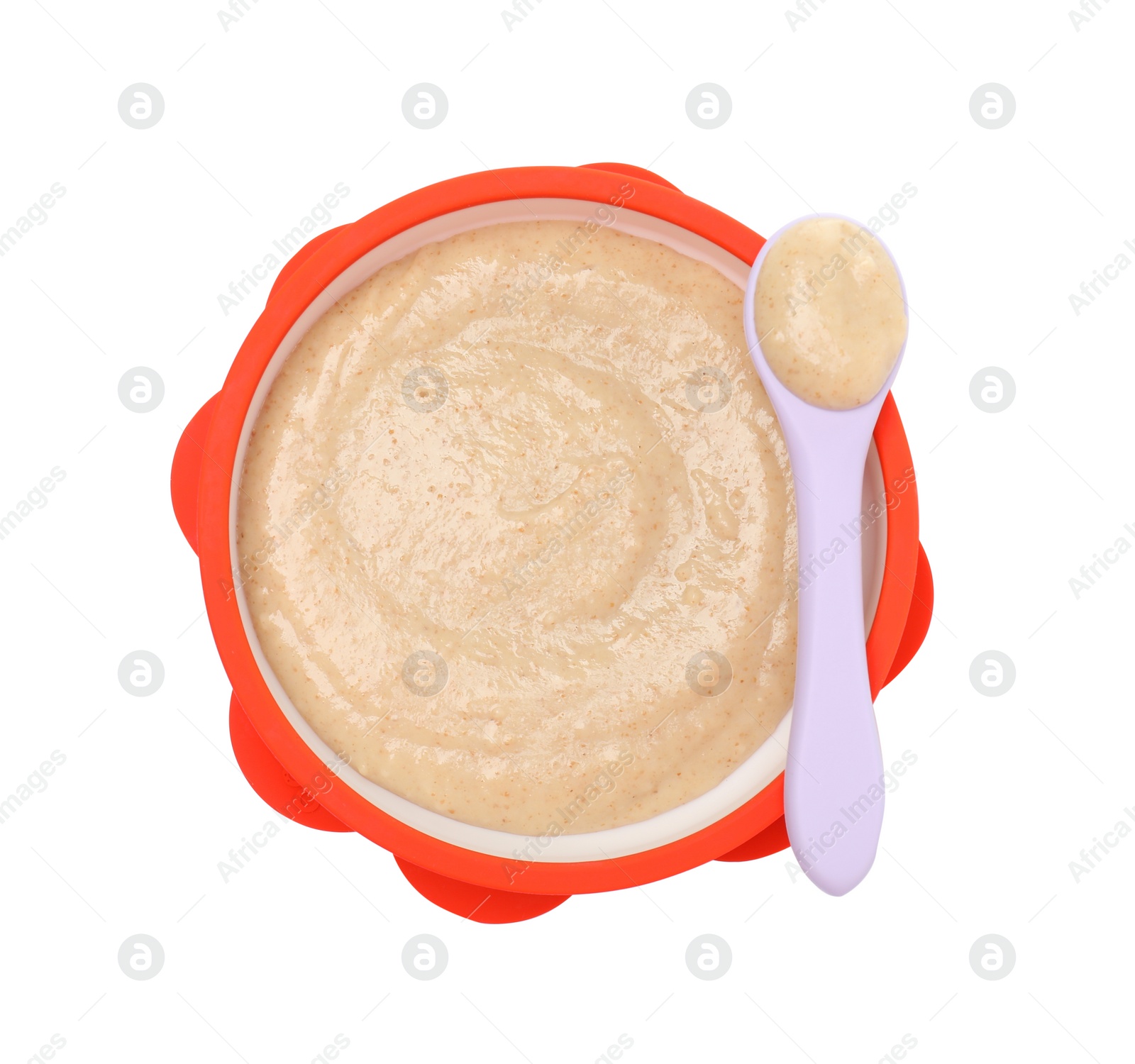 Photo of Tasty baby food in bowl and spoon isolated on white, top view