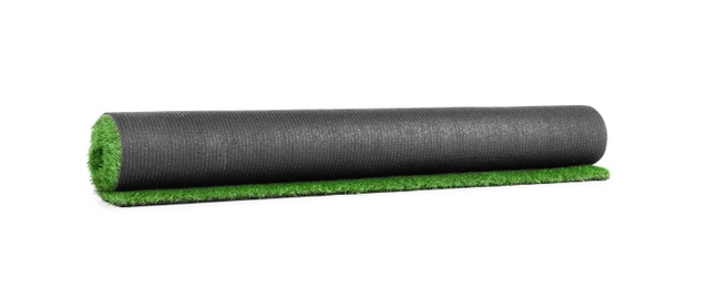 Rolled artificial grass carpet on white background. Exterior element