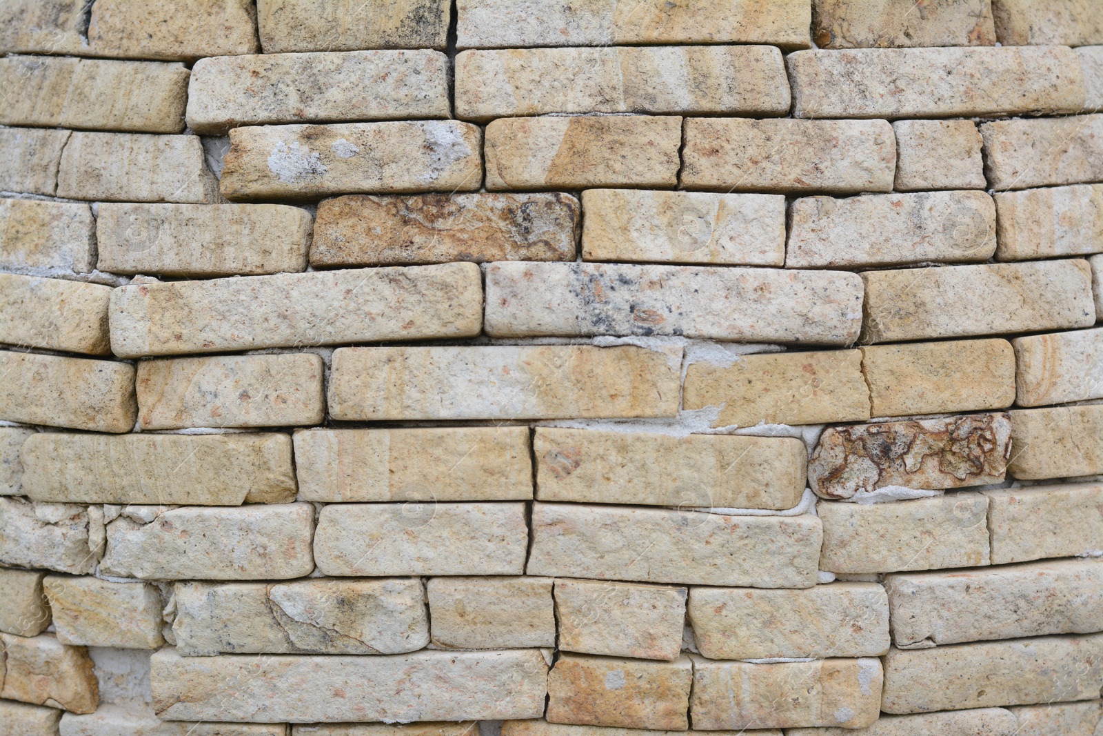 Photo of Texture of old stone wall as background, closeup