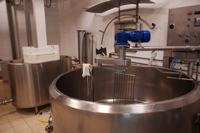 Empty curd preparation tank at cheese factory