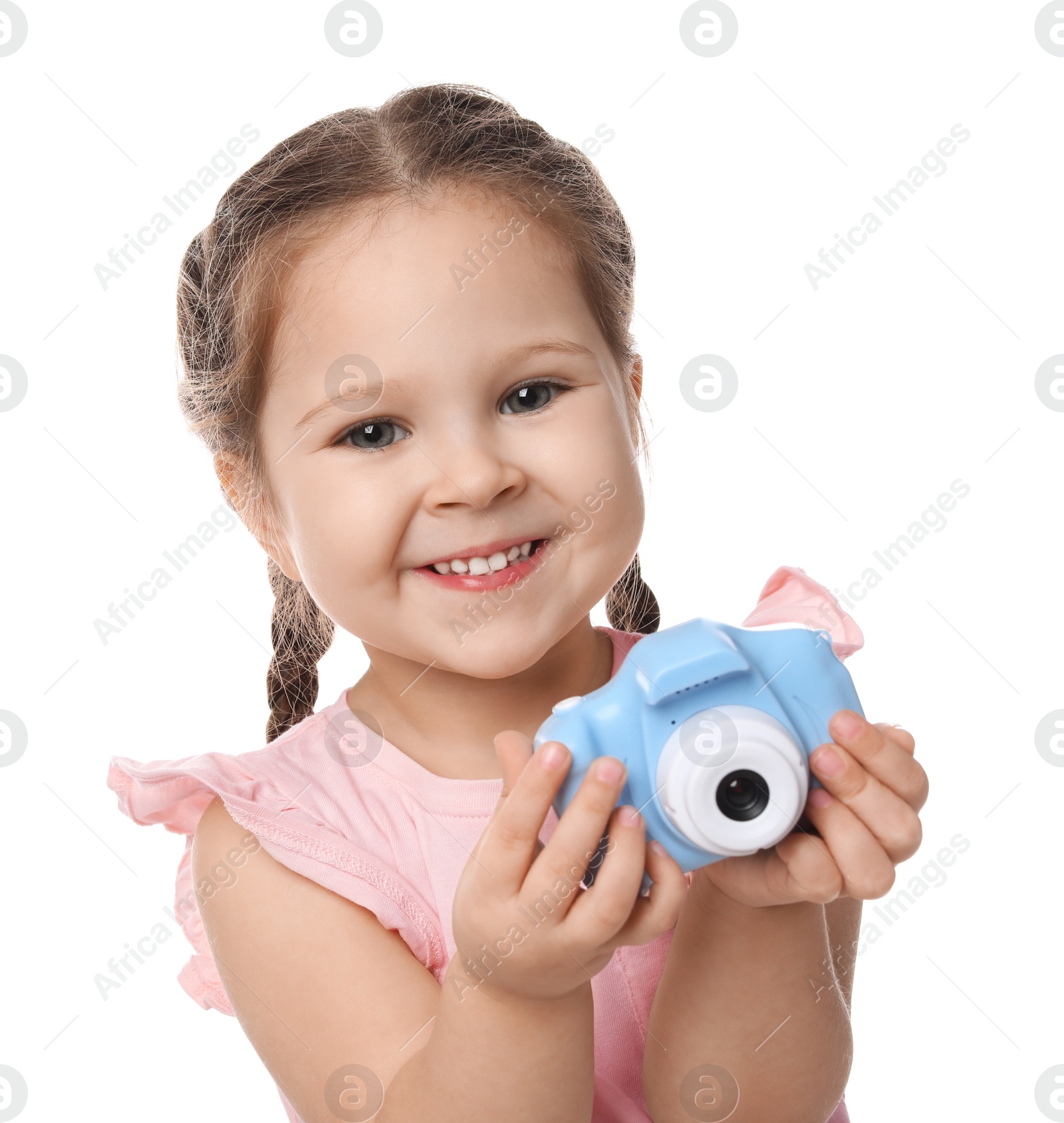 Photo of Little photographer with toy camera on white background