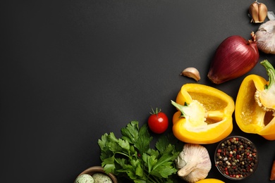 Photo of Flat lay composition with ingredients for cooking on black background. Space for text