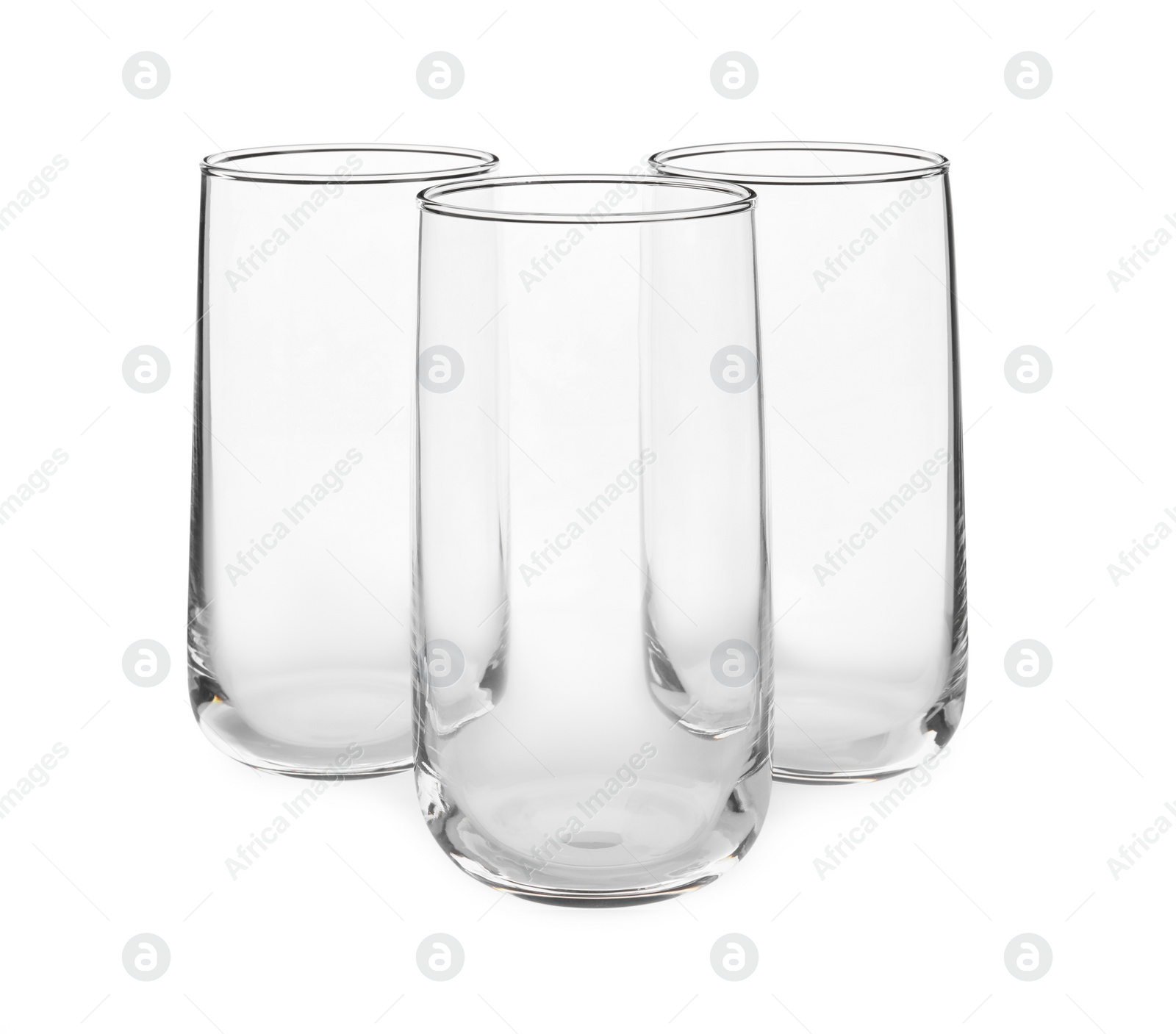 Photo of New clean empty glasses on white background