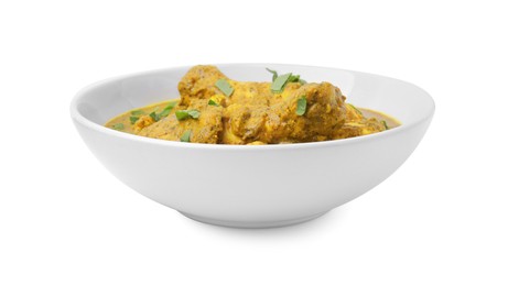 Photo of Delicious chicken with curry sauce and basil isolated on white