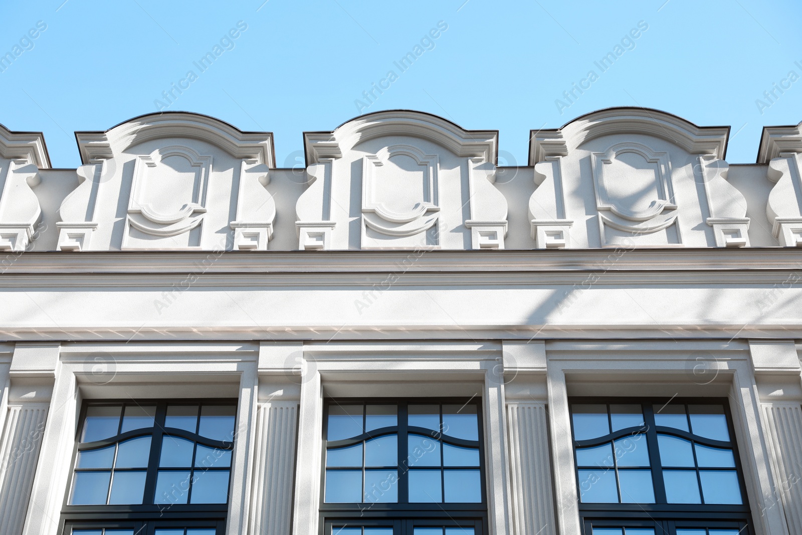 Photo of Beautiful old building against blue sky, low angle view