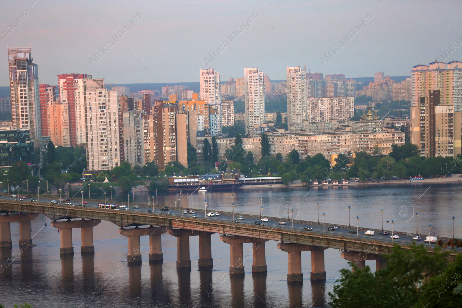 Photo of KYIV, UKRAINE - MAY 23, 2019: Beautiful view of Paton bridge over Dnipro river