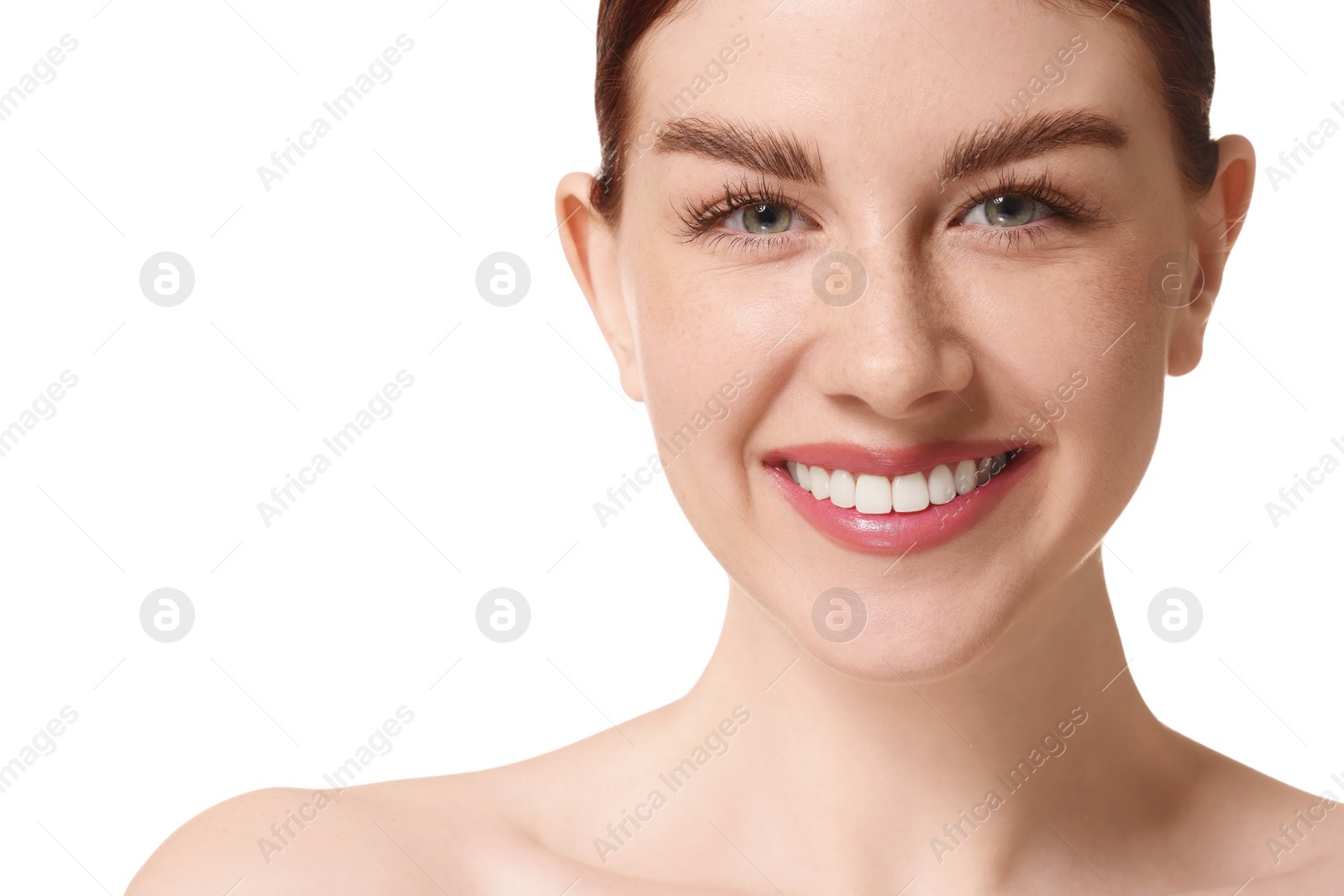 Photo of Portrait of smiling woman on white background, closeup