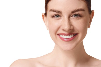 Portrait of smiling woman on white background, closeup