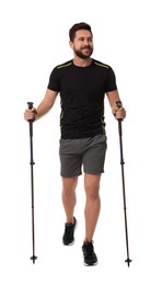 Man practicing Nordic walking with poles isolated on white