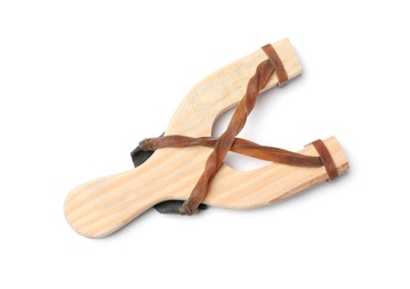 Photo of One wooden slingshot with leather pouch isolated on white, top view