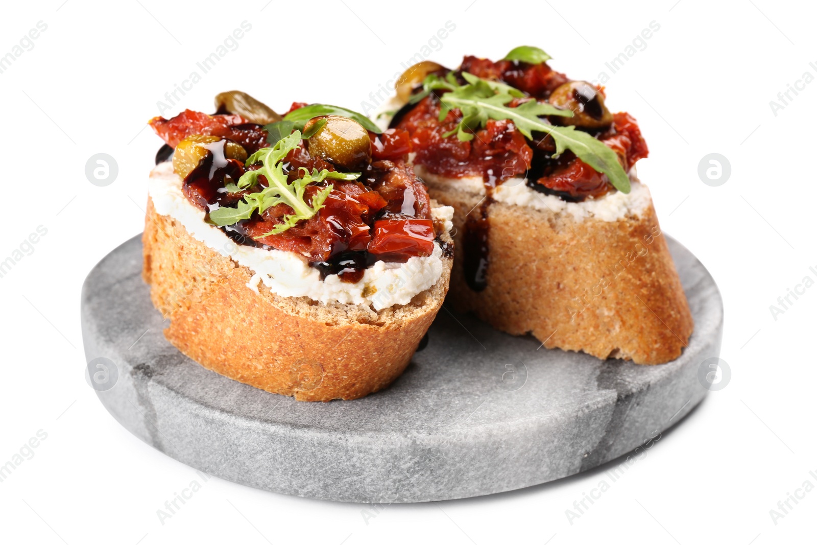 Photo of Delicious bruschettas with balsamic vinegar and toppings isolated on white