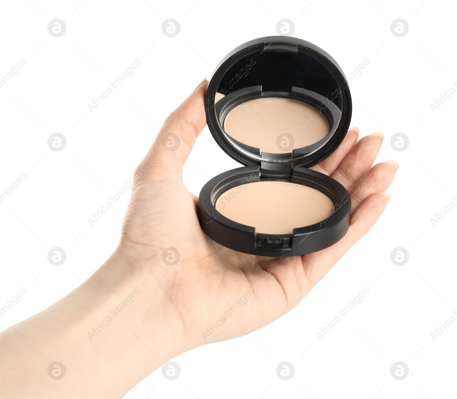 Photo of Woman holding black pocket powder with mirror on white background, closeup. Cosmetic product