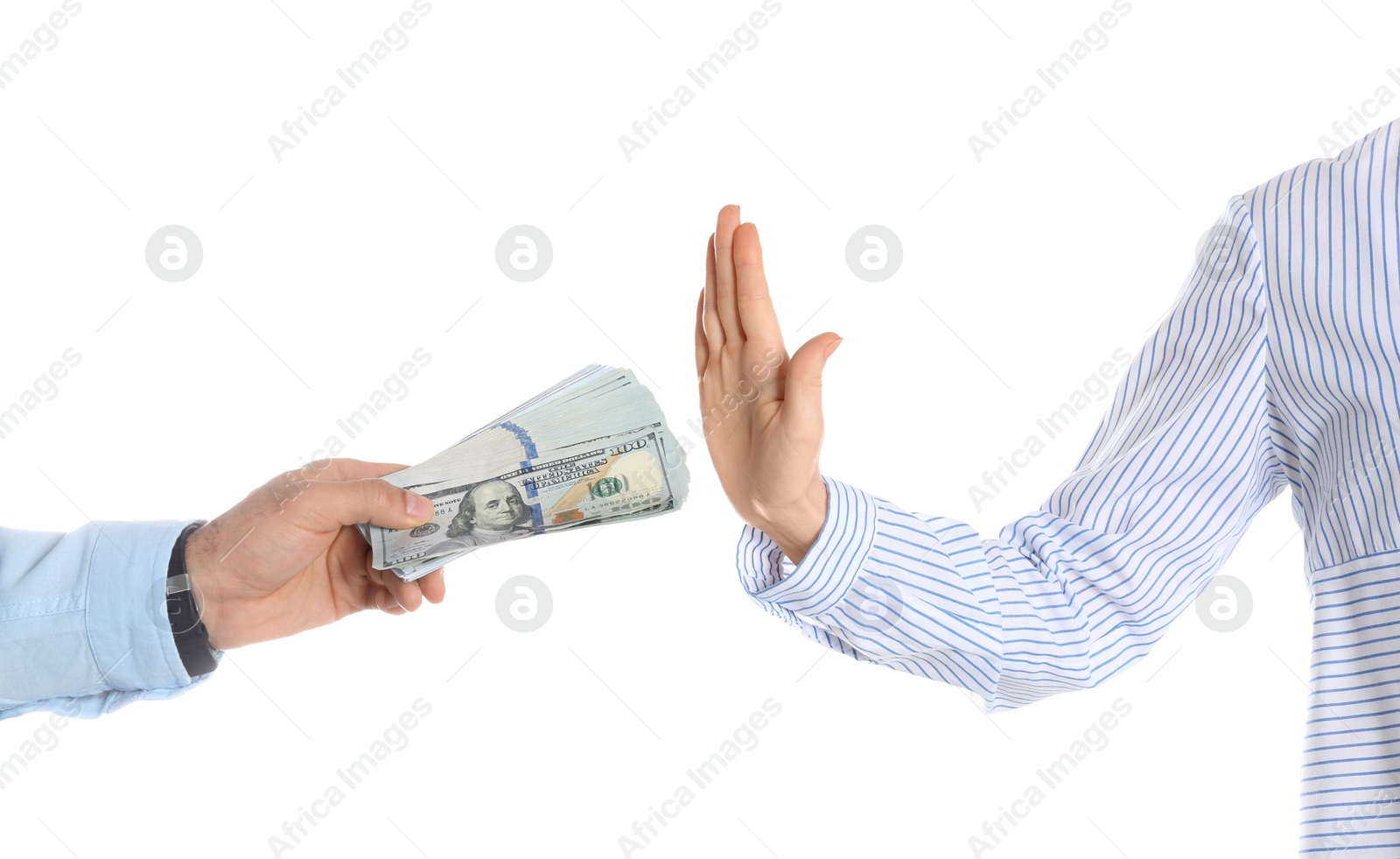 Photo of Woman refusing to take bribe on white background, closeup of hands