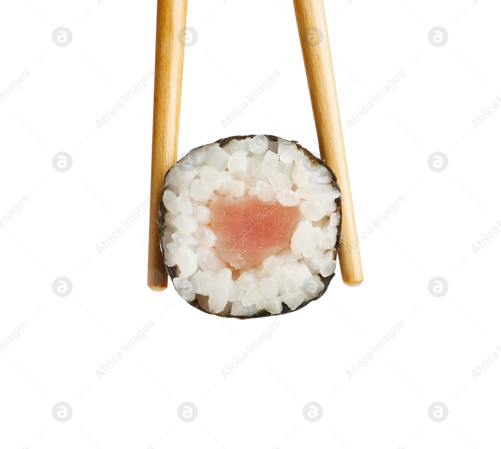 Photo of Chopsticks with tasty fresh sushi roll isolated on white