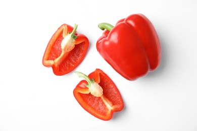 Raw ripe paprika peppers on white background, top view