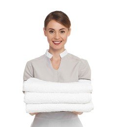 Photo of Portrait of chambermaid with towels on white background