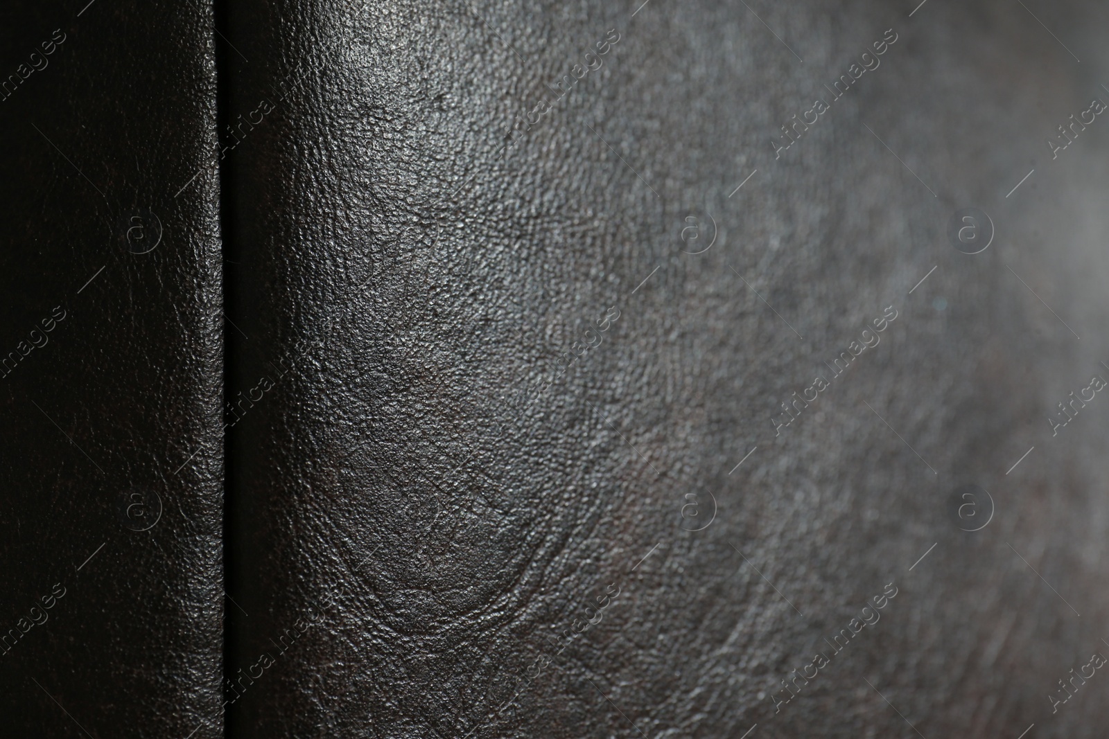 Photo of Texture of black leather as background, closeup