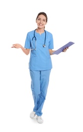 Full length portrait of medical doctor with clipboard and stethoscope isolated on white