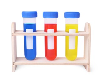 Photo of Test tubes with colorful liquids in wooden stand isolated on white. Kids chemical experiment set