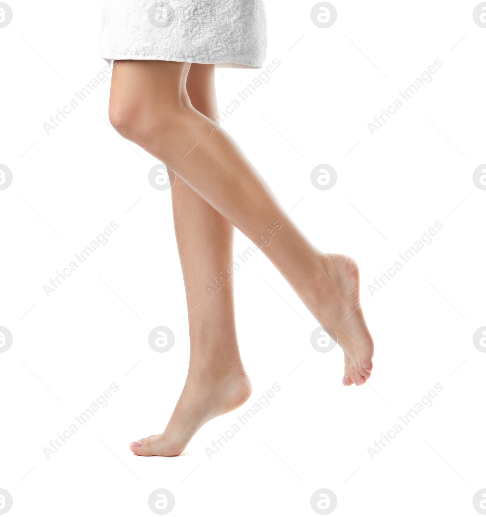 Photo of Woman with beautiful legs on white background, closeup. Spa treatment