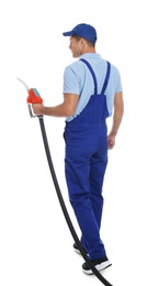 Photo of Gas station worker with fuel nozzle on white background, back view