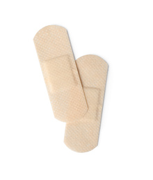 Photo of Medical sticking plasters isolated on white. First aid item