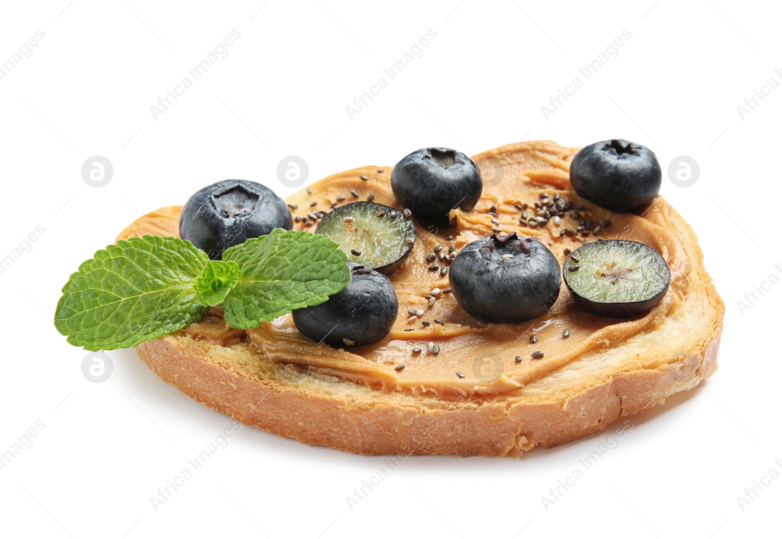 Photo of Tasty toast with blueberries, peanut butter and chia seeds on white background