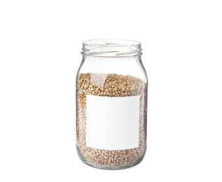 Photo of Organic green buckwheat in jar with blank label isolated on white